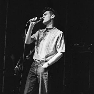Morrissey, lead singer of Manchester group The Smiths, performing in concert