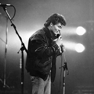 Morten Harket, lead singer of the Norwegian pop group A-ha, performing live on stage