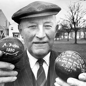 Mr. Joe Iceton, of Sedgefield, with two of the footballs used in the past Shrove Tuesday