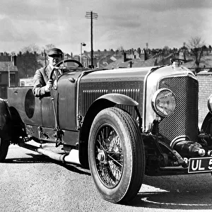 Mr. Tom Whale at the wheel of a Bentley Speed Six which he paid £