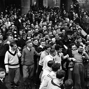 Mr Winston Churchill is carried by students at Bristol University. December 1929