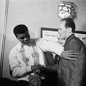 Muhammad Ali (Cassius Clay) and Henry Cooper at a press conference ahead of their