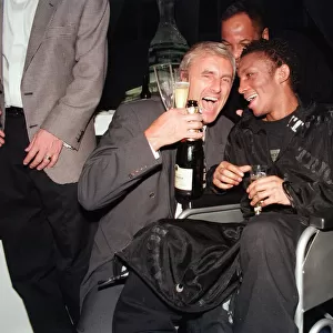 Musician Tricky, in a wheelchair pictured with another guest at the Brit Music Awards at