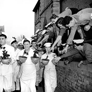 Navy cooks with Christmas puddings. 23rd November 1956 Local Caption