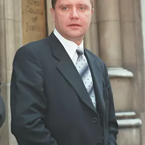 NIGEL MARTIN SMITH MANAGER OF TAKE THAT LEAVING THE HIGH COURT TO DAY