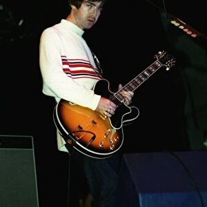 Noel Gallagher of Oasis singing at their Knebworth concert
