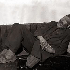 Old man sleeping on a bench - October 1963