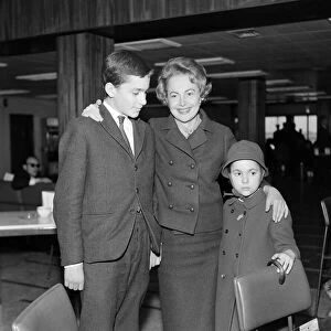 Olivia De Havilland at London Airport with her children Benjamin