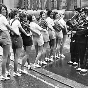 On parade in hot pants to the pipes of the Gurkha rifles