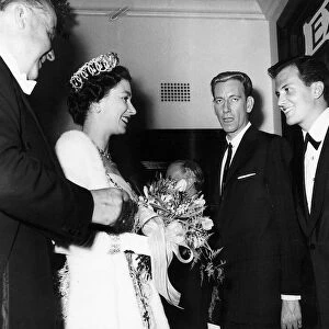 Pat Boone singer and actor with Ron Parry and Antonio the dancer meet the Queen Elizabeth