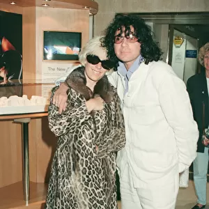 Paula Yates and her boyfriend, INXS singer Michael Hutchence leave Heathrow Airport for