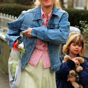 PAULA YATES WALKS PEACHES TO SCHOOL TODAY