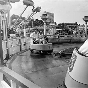 People enjoying the rides at Dreamland amusement park in Margate, Kent. 14th July 1966