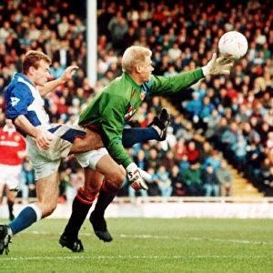 Peter Schmeichel Manchester United goalkeeper in a tangle with Alan Shearer of Blackburn