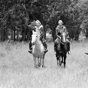 The Police, pop / rock group, pictured riding horses. Left is guitarist Andy