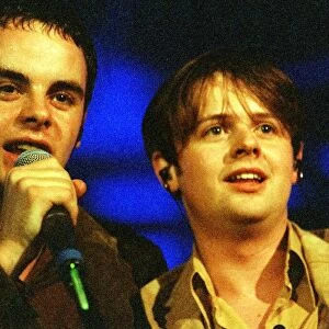 Pop duo Ant and Dec singing on stage at the Glasgow Royal Concert Hall