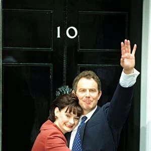 Prime Minister Tony Blair And Cherie Blair, waving to the crowds as they prepare to enter