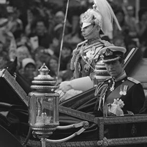 Prince Charles accompanied by his brother Prince Andrew in their open topped carriage en