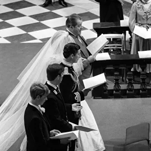 Prince Charles and Lady Diana stand at the altar in St Pauls Cathedral with Diana