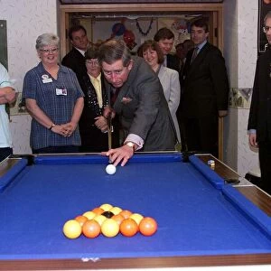 Prince Charles plays pool as he visits North Derbyshire Hospital in Calow February