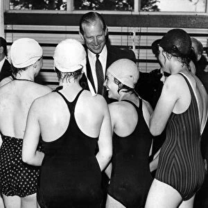 Prince Philip, Duke of Edinburgh with some of the girls who were taking their award