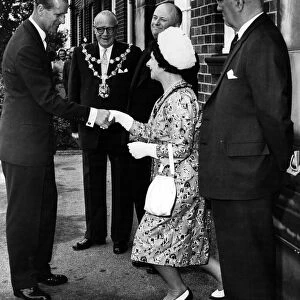 Prince Philip, Duke of Edinburgh shakes hands with the Mayoress of Leigh on his arrival