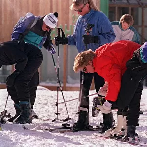 PRINCESS DIANA, WEARING SKI-INT OUTFIT CHECKING PRINCE HARRY