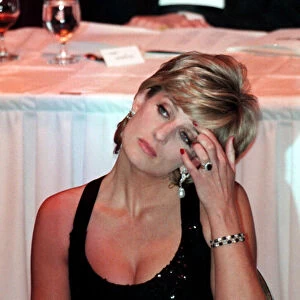 Princess Diana wears black evening dress during a reception where she was to receive a