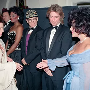 Princess Margaret meets Elizabeth Taylor at a gala dinner in aid of the AIDS Crisis Trust