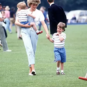 Princess of Wales with Prince Harry and Prince William during a polo match at Smith