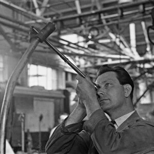 Quality control at the BSA Factory, Small Heath, Birmingham seen here inspecting