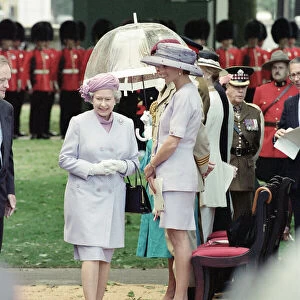 Queen Elizabeth II and Diana, Princess of Wales attend the unveiling of the Canadian War