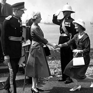 Queen Elizabeth II is introduced to the Duchess of Northumberland during a visit to Holy