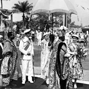 Queen Elizabeth II and Prince Philip bid farewell to the Oba (or King) Adenji-Adele II