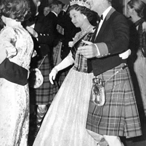 Queen Elizabeth II and Prince Philip dancing a Reel at a Royal Ball in Scotland