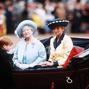 Queen Elizabeth, the Queen Mother and Diana, Princess of Wales ride together with young