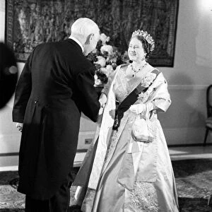 The Queen Mother is greeted by West German president Theodor Heuss as she arrives at