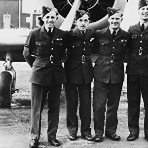 R. A. F. pilots win their wings at Medicine Hat, Alberta. Left to right: J. N. Harrison, J. J