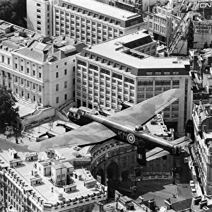 The RAFs only Lancaster bomber pictured in flight over Central London