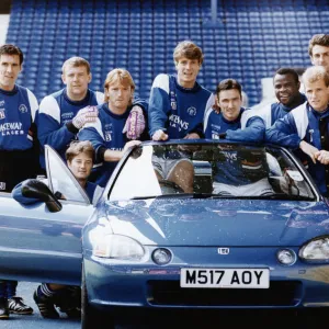 The Rangers first team try out a Honda for size at the launch of the £