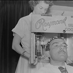 Raymond, hair stylist, has "poodle cut"DM 9 / 3 / 1951 Staff