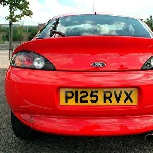BACK REAR OF A RED FORD PUMA CAR REGISTRATION NUMBER P125 RVX AUGUST 1997