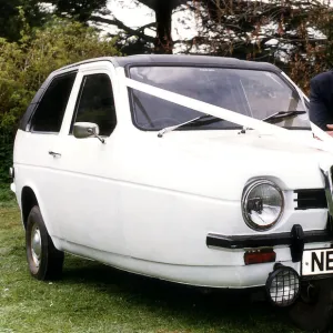 Reliant Robin Wedding car and owner chauffeur Martyn Secrett