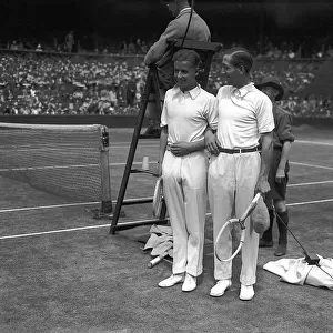 Rene Lacoste and H W Austin pose for the camera before their centre court match at