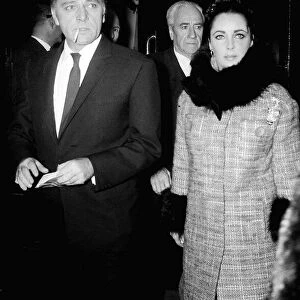 Richard Burton Actor Jan 1965 and wife Elizabeth Taylor at the Adelphi theatre to see