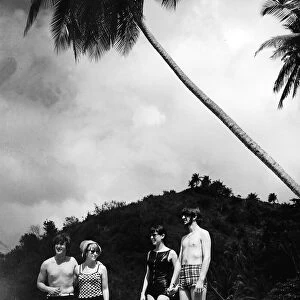 Ringo Starr and John Lennon with their wives in Tobago in January 1966 Cynthia
