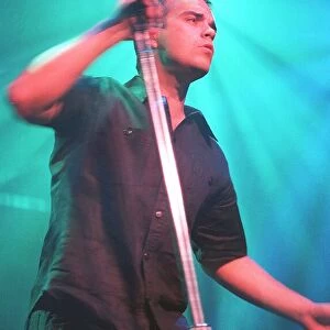 Robbie Wiiliams on stage at Middlesbrough Town Hall, 1998. Pic from Tark