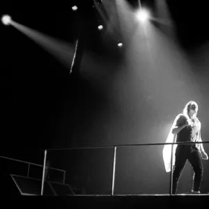 Rock group U2 in concert in USA - May 1987 Bono under the spotlight