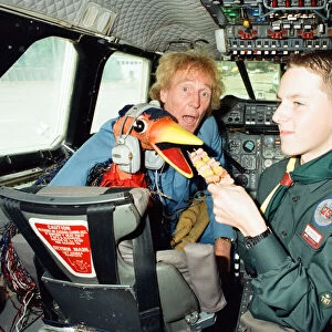 Rod Hull and Emu on the flight deck of a British Airways Concorde with Venture scouts
