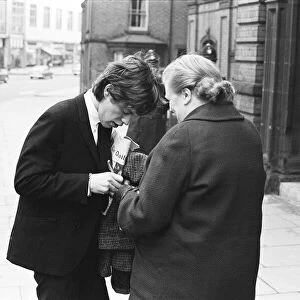 Rolling Stones; Mick Jagger signs an autograph outside the court at Tattenhall